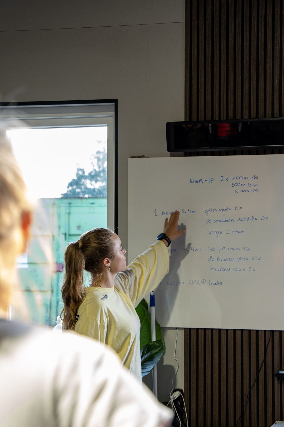 Coaching tijdens een groepstraining bij Evolve